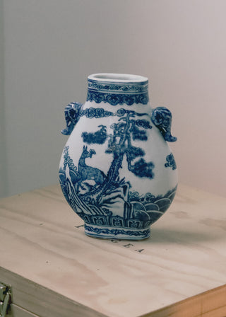 Blue and white porcelain vase with landscape design