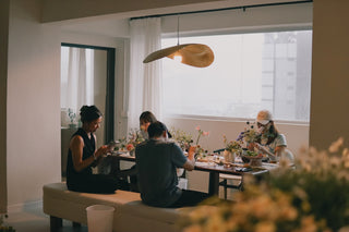 Guests enjoying a meal in a modern, cozy dining space